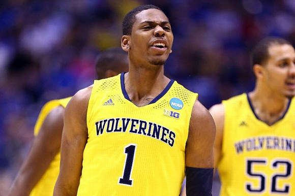 Glenn Robinson III (1) and Jordan Morgan (52)