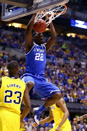 Caris LeVert (23) and Jon Horford (15)