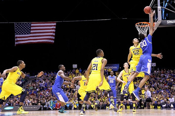 Glenn Robinson III (1), Zak Irvin (21), Derrick Walton Jr. (10), Nik Stauskas (11), and Jordan Morgan (52)