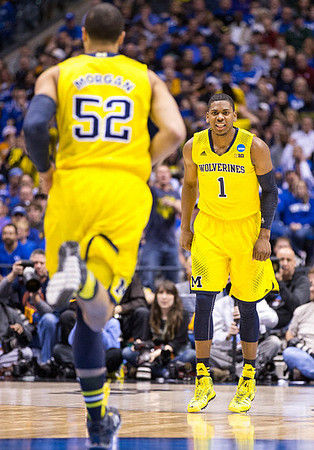 Jordan Morgan (52) and Glenn Robinson III (1)