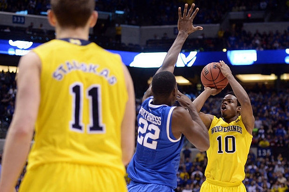 Nik Stauskas (11) and Derrick Walton Jr. (10)