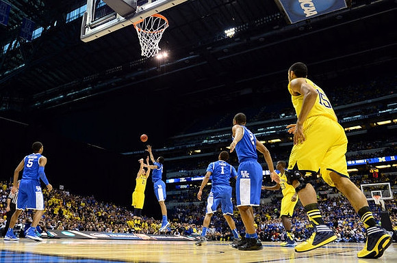 Nik Stauskas (11), Caris LeVert (23), and Jon Horford (15)
