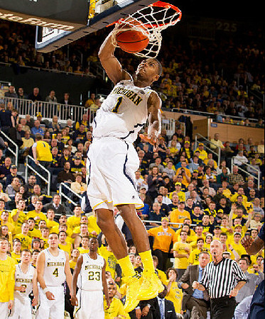 Glenn Robinson III (1), Mitch McGary (4), and Caris LeVert (23)