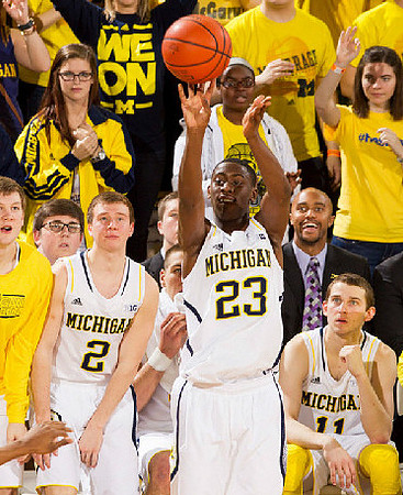 Matt Vogrich (13), Spike Albrecht (2), Caris LeVert (23), Nik Stauskas (11), and C.J. Lee