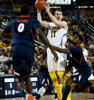 Nik Stauskas (11) and Trey Burke (3)