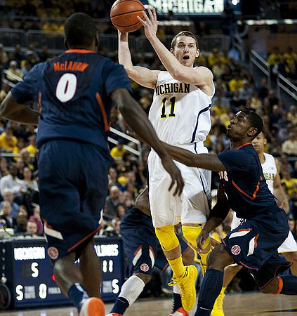 Nik Stauskas (11) and Trey Burke (3)