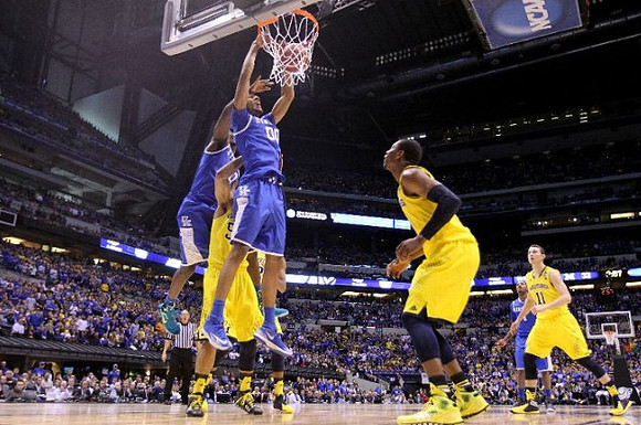 Jordan Morgan (52), Glenn Robinson III (1), and Nik Stauskas (11)