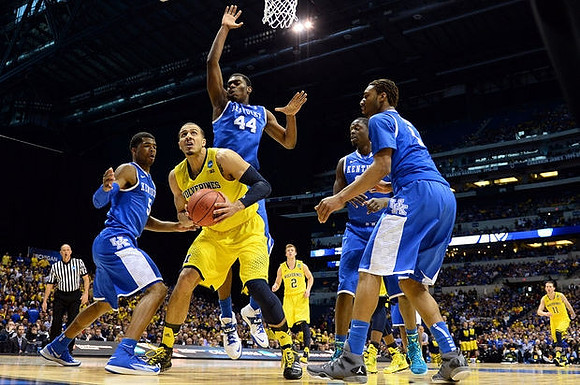Jordan Morgan (52), Spike Albrecht (2), and Nik Stauskas (11)