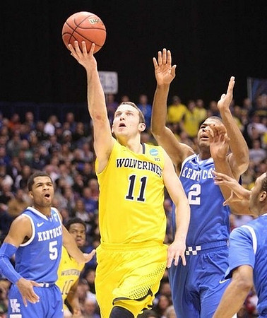 Nik Stauskas (11) and Derrick Walton Jr. (10)