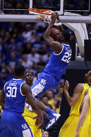 Caris LeVert (23) and Jon Horford (15)
