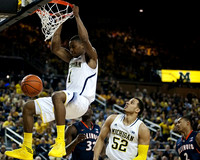 Glenn Robinson III (1) and Jordan Morgan (52)