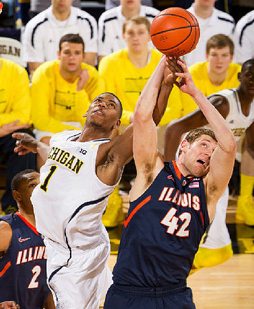 Glenn Robinson III (1) and Caris LeVert (23)