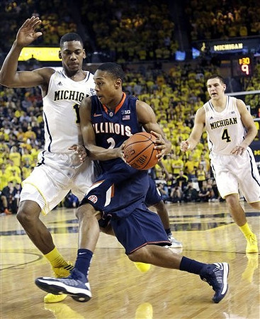 Glenn Robinson III (1) and Mitch McGary (4)