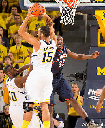 Jon Horford (15) and Tim Hardaway Jr. (10)