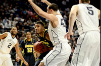 Zak Irvin (21) and Muhammad-Ali Abdur-Rahkman (12)