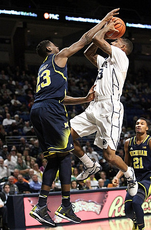 Caris LeVert (23) and Zak Irvin (21)