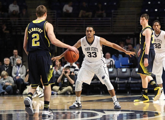 Spike Albrecht (2) and Ricky Doyle (32)