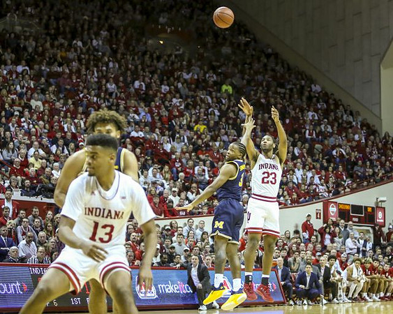 Isaiah Livers (4) and Zavier Simpson (3)