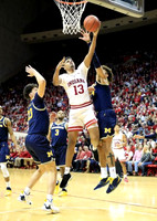 Charles Matthews (1), Brandon Johns Jr. (23), Zavier Simpson (3), and Isaiah Livers (4)