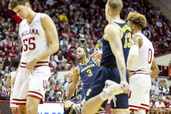 Zavier Simpson (3) and Ignas Brazdeikis (13)