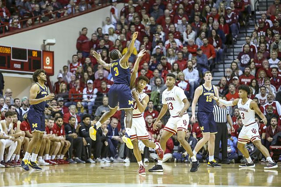 Isaiah Livers (4), Zavier Simpson (3), and Jon Teske (15)
