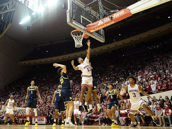 Charles Matthews (1), Zavier Simpson (3), Brandon Johns Jr. (23), and Jordan Poole (2)