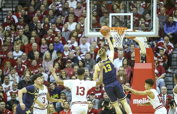 Brandon Johns Jr. (23) and Ignas Brazdeikis (13)
