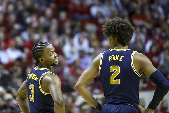 Zavier Simpson (3) and Jordan Poole (2)