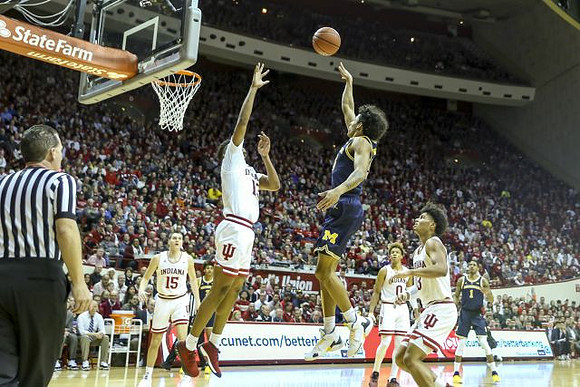 Eli Brooks (55) and Charles Matthews (1)