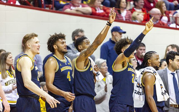 Ignas Brazdeikis (13), Isaiah Livers (4), Charles Matthews (1), Jordan Poole (2), and Zavier Simpson (3)