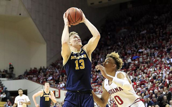 Ignas Brazdeikis (13) and Jon Teske (15)