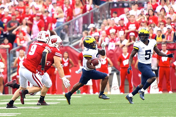 A.J. Henning (3) and Mike Sainristil (5)