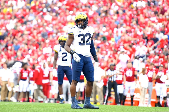 Brad Hawkins (2) and Jaylen Harrell (32)