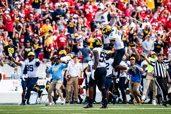 Donovan Jeter (95), David Ojabo (55), and Brad Hawkins (2)