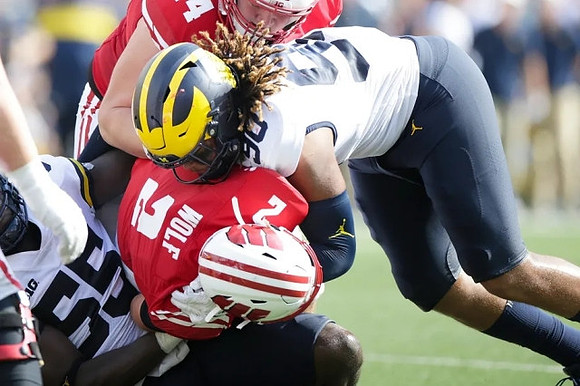 David Ojabo (55) and Mike Morris (90)