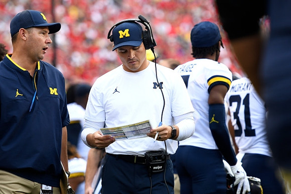 Mike Macdonald, Makari Paige (7), and Jordan Morant (31)