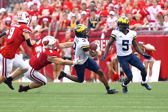A.J. Henning (3) and Mike Sainristil (5)