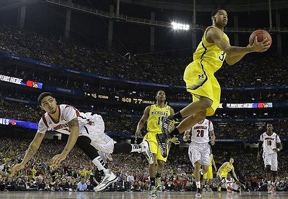 Glenn Robinson III (1), Trey Burke (3), and Nik Stauskas (11)