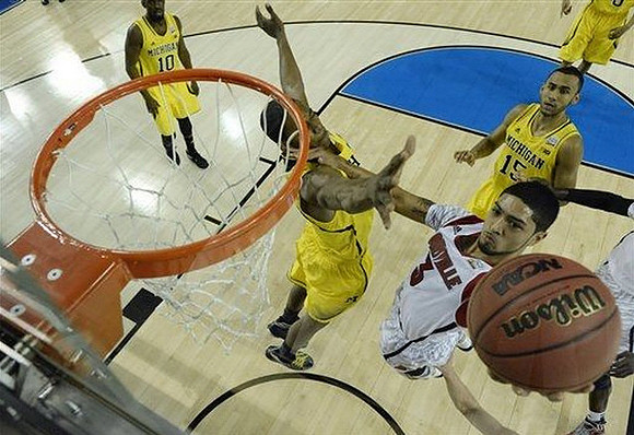 Tim Hardaway Jr. (10), Glenn Robinson III (1), Jon Horford (15), and Trey Burke (3)
