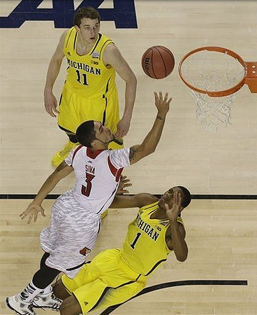 Nik Stauskas (11) and Glenn Robinson III (1)