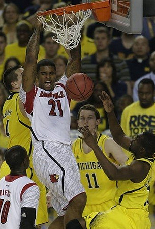 Mitch McGary (4), Nik Stauskas (11), and Tim Hardaway Jr. (10)