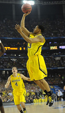 Mitch McGary (4) and Trey Burke (3)
