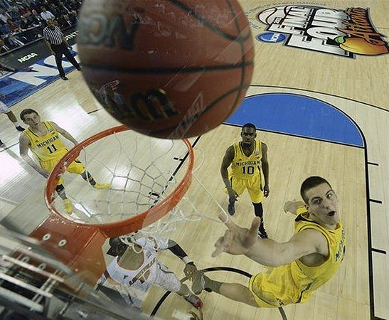 Nik Stauskas (11), Tim Hardaway Jr. (10), and Mitch McGary (4)