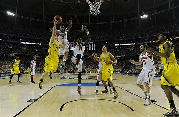 Tim Hardaway Jr. (10), Spike Albrecht (2), Mitch McGary (4), and Glenn Robinson III (1)