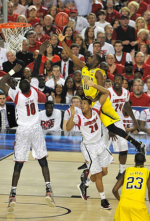 Tim Hardaway Jr. (10) and Caris LeVert (23)