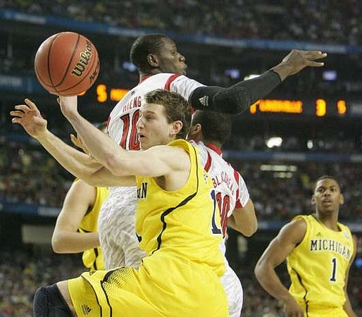Nik Stauskas (11) and Glenn Robinson III (1)