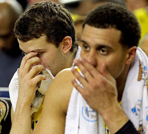 Nik Stauskas (11) and Jordan Morgan (52)