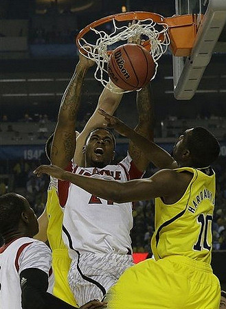 Mitch McGary (4) and Tim Hardaway Jr. (10)