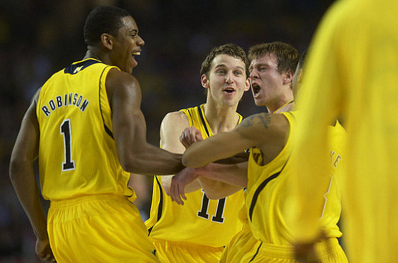 Glenn Robinson III (1), Nik Stauskas (11), and Spike Albrecht (2)