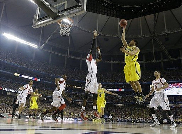 Trey Burke (3), Glenn Robinson III (1), and Mitch McGary (4)
